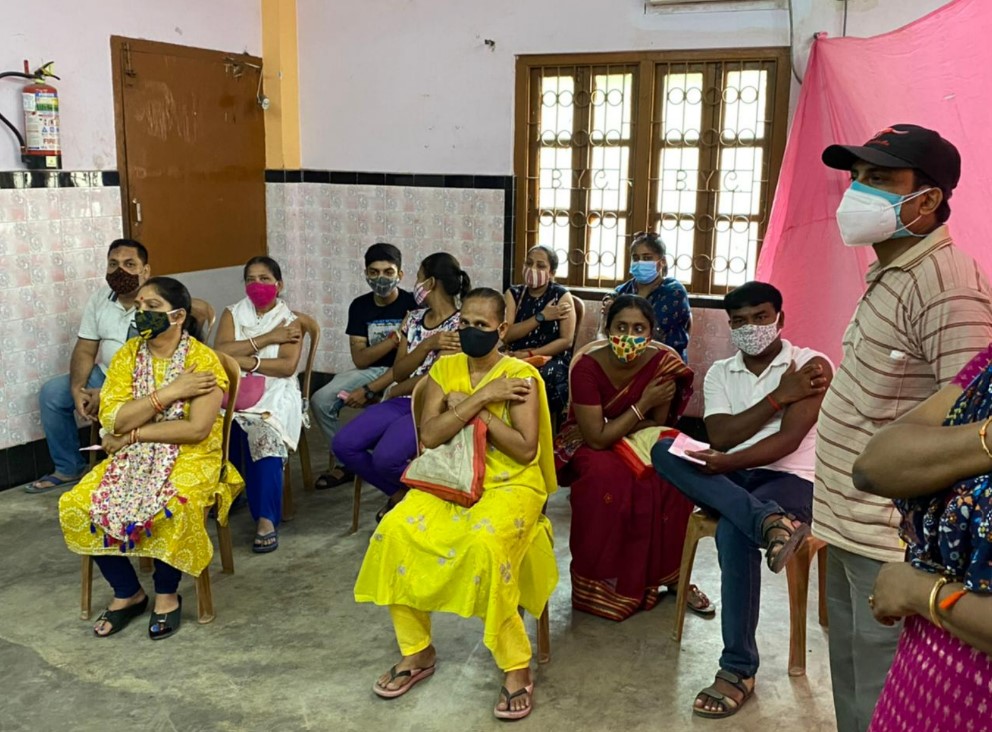 Community members seated for post-vaccination observation at Medicare COVID vaccination camp