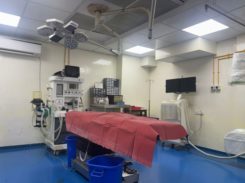 Medicare Nursing Home — modern operation theatre with surgical lights and ATHENA anesthesia workstation