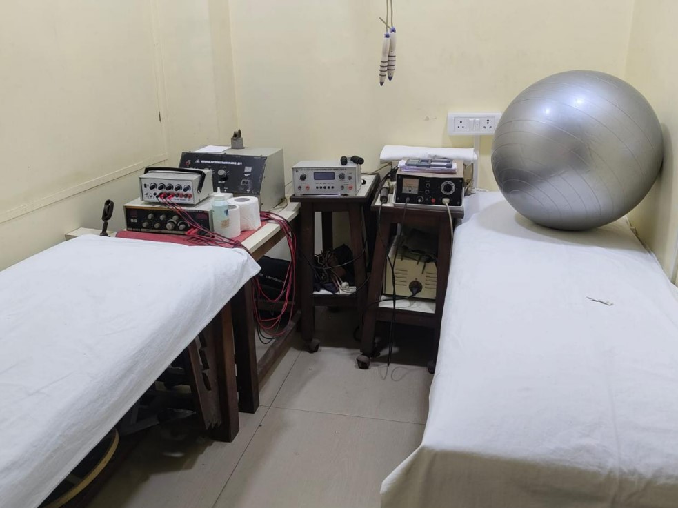 Medicare physiotherapy treatment room with electrotherapy equipment and treatment beds
